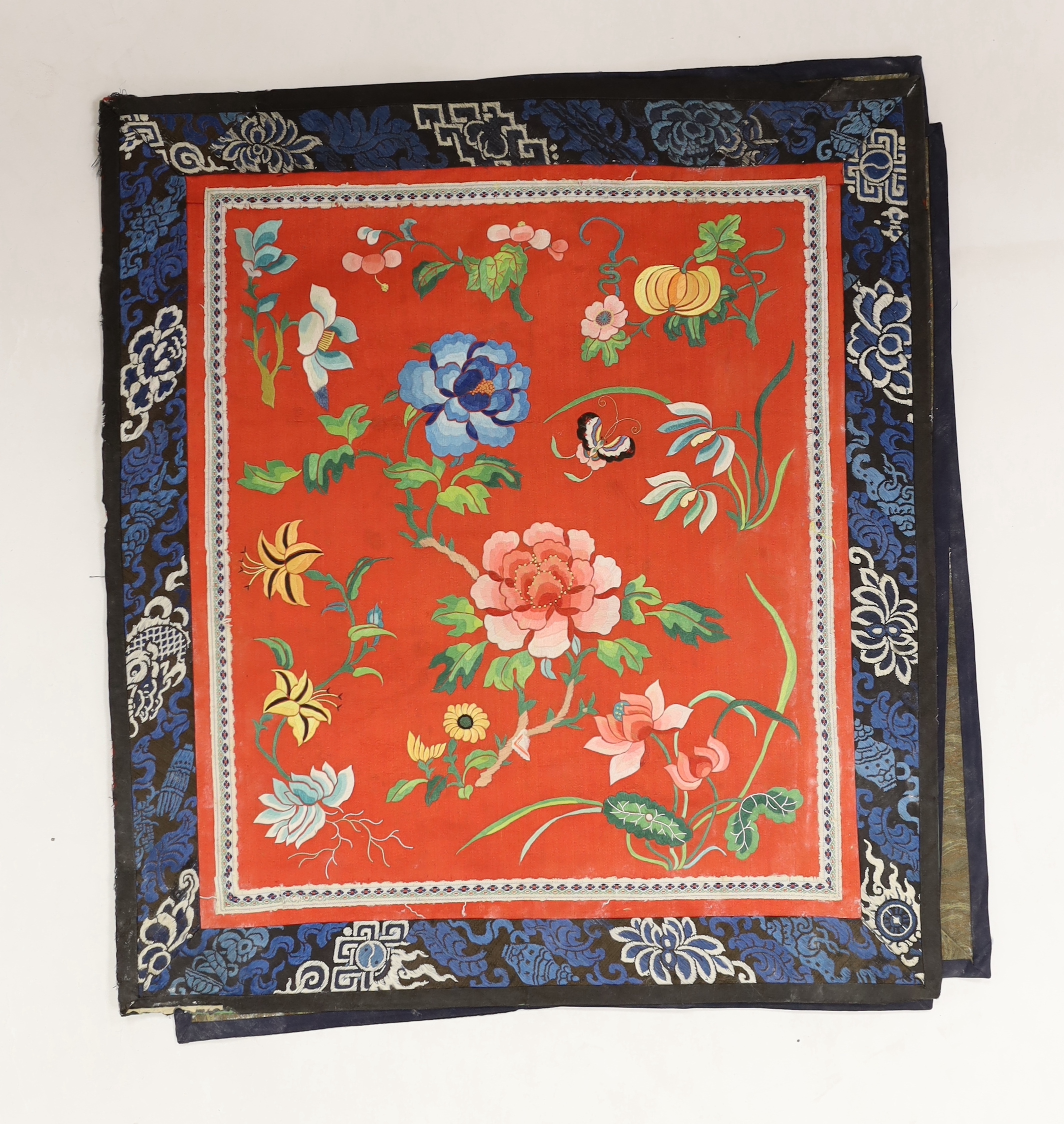 Nine Chinese silk embroidered panels, framed with silk damask borders, circa 20th century, largest 37cm x 41cm